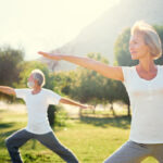 Yoga,At,Park.,Senior,Family,Couple,Exercising,Outdoors.,Concept,Of