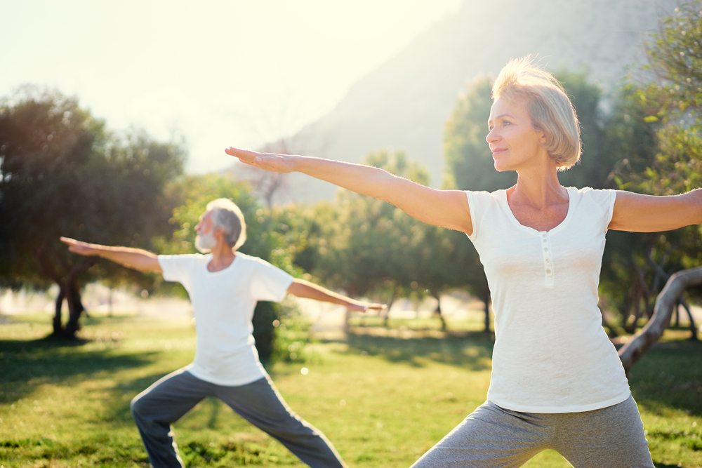 Yoga,At,Park.,Senior,Family,Couple,Exercising,Outdoors.,Concept,Of