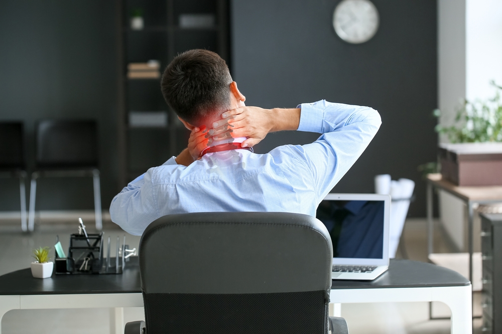 Businessman,Feeling,Neck,Pain,In,Office