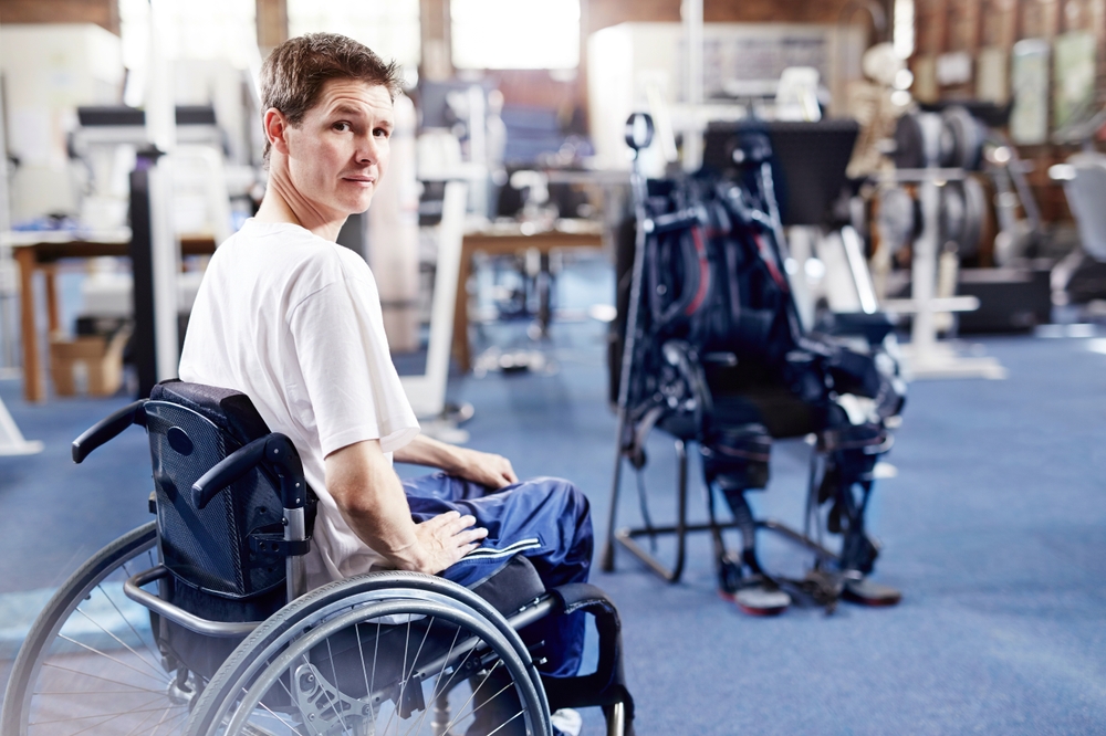 Man,In,Wheelchair,Waiting,For,Physical,Therapy